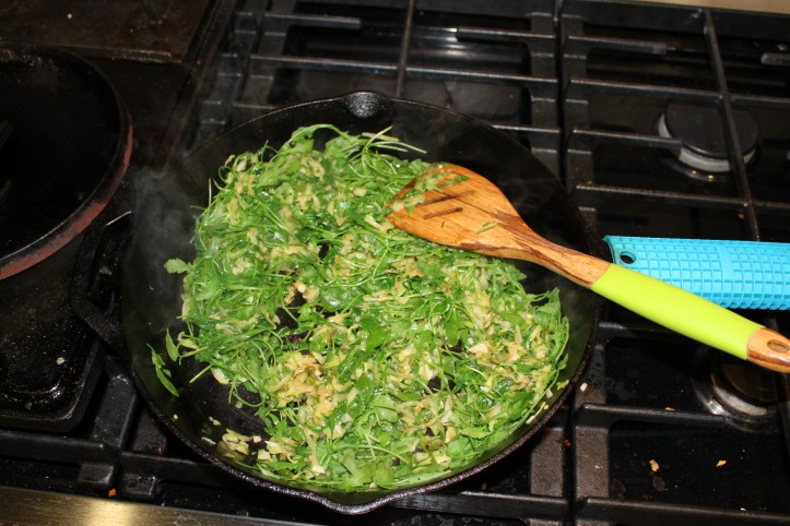 Sauteed garlic, zucchini and arugula